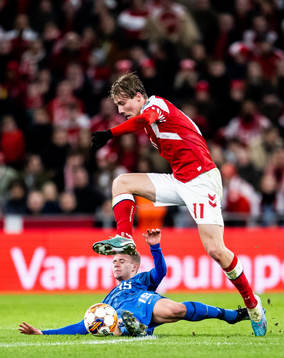 Rasmus Højlund of Denmark and Marcus Forss of Finland