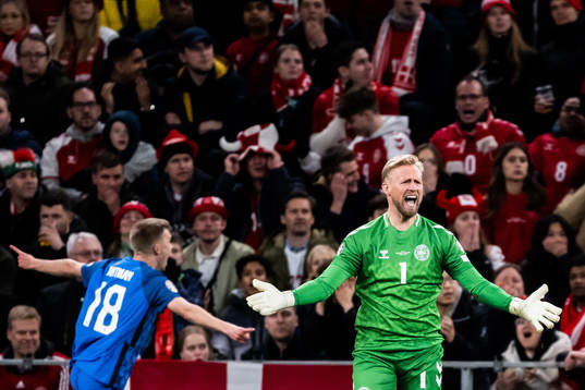Goalkeeper Kasper Schmeichel of Denmark reacts as Oliver