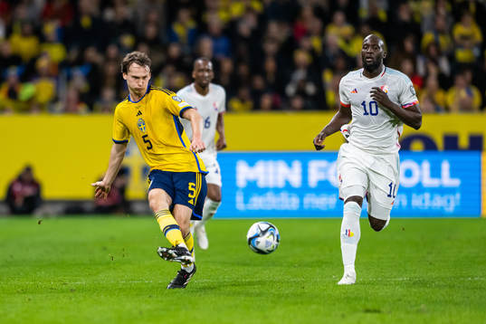 Hjalmar Ekdal of Sweden and Romelu Lukaku of Belgium