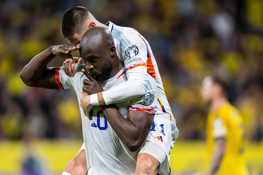 Romelu Lukaku of Belgium celebrates with Yannick Carrasco