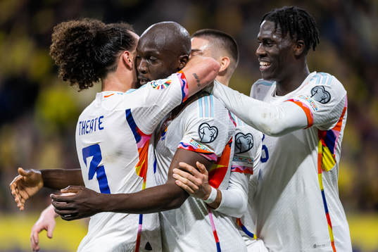Romelu Lukaku of Belgium celebrates with Arthur Theate and