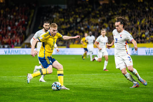 Dejan Kulusevski of Sweden and Arthur Theate of Belgium