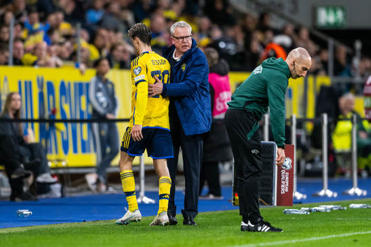 Kristoffer Olsson and head coach Janne Andersson of Sweden