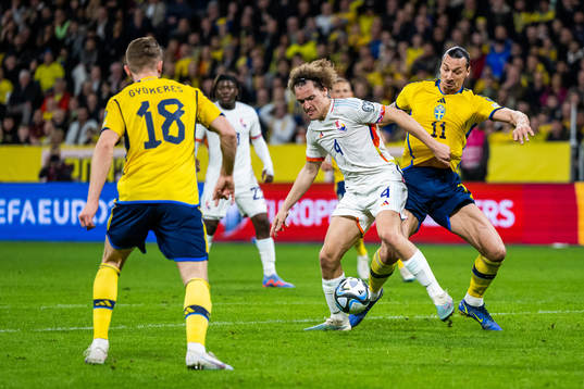 Wout Faes of Belgium and Zlatan Ibrahimovic of Sweden