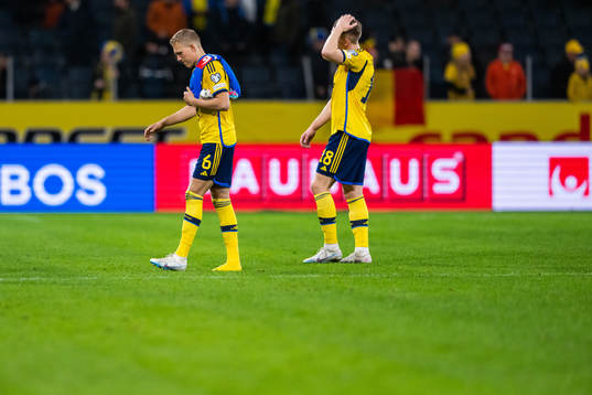 Ludvig Augustinsson and Viktor Gyökeres of Sweden look