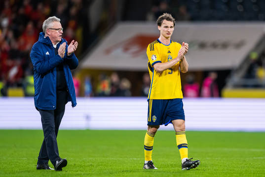 Head coach Janne Andersson and Hjalmar Ekdal of Sweden look