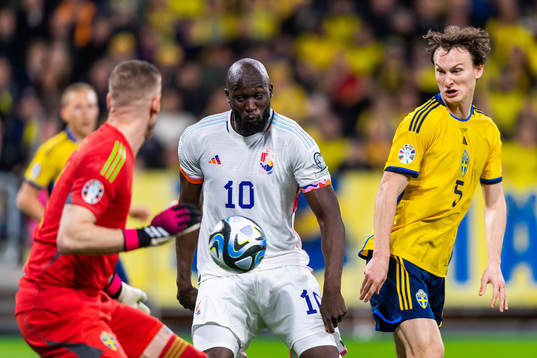 Romelu Lukaku of Belgium and Hjalmar Ekdal of Sweden