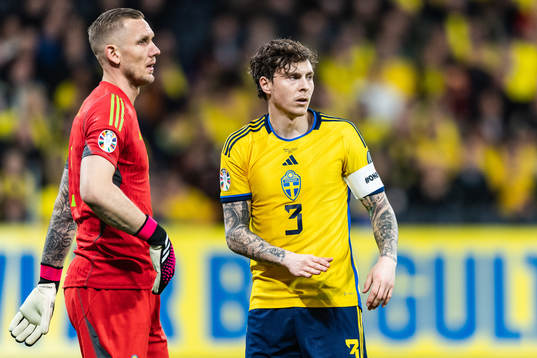 Goalkeeper Robin Olsen and Victor Nilsson Lindelöf of