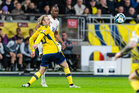Emil Forsberg of Sweden and Dodi Lukebakio of Belgium