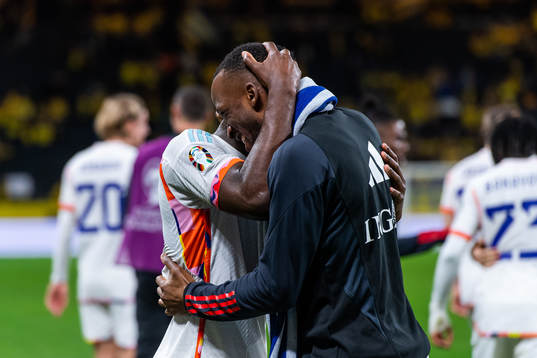 Orel Mangala and Dodi Lukebakio of Belgium celebrate