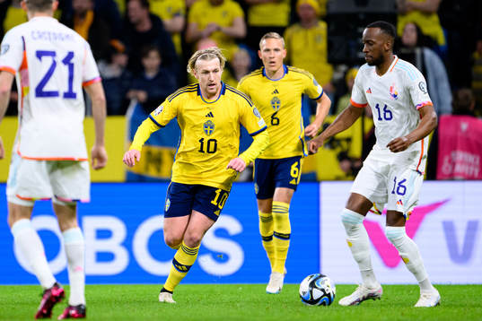 Emil Forsberg of Sweden and Dodi Lukebakio of Belgium
