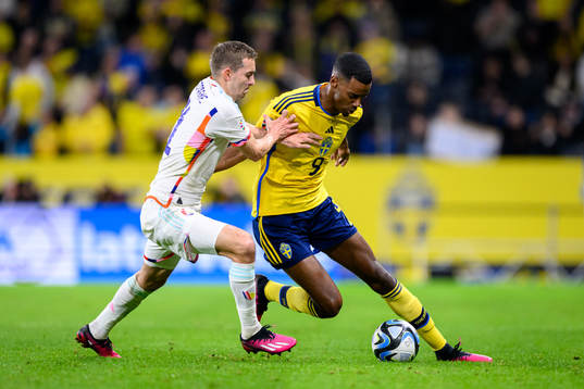 Timothy Castagne of Belgium and Alexander Isak of Sweden