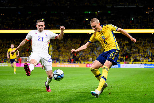 Timothy Castagne of Belgium and Ludvig Augustinsson of