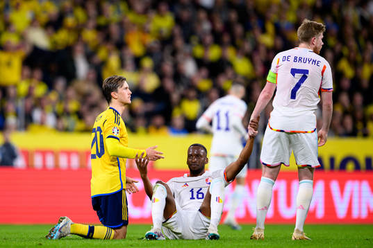Kristoffer Olsson of Sweden and Dodi Lukebakio of Belgium