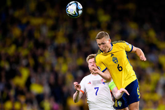 Kevin de Bruyne of Belgium and Ludvig Augustinsson of Sweden