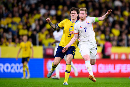 Victor Nilsson Lindelöf of Sweden and Kevin de Bruyne of
