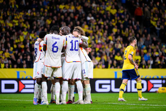 The Belgian players celebrate