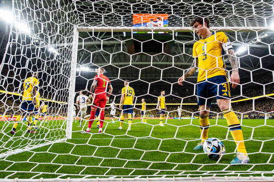 Victor Nilsson Lindelöf of Sweden looks dejected as Romelu