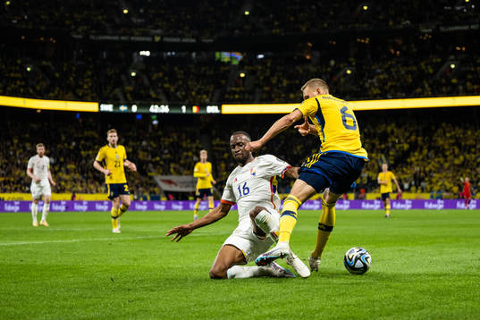 Dodi Lukebakio of Belgium and Ludwig Augustinsson of Sweden