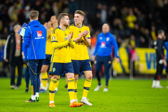 Gabriel Gudmundsson of Sweden and Viktor Gyökeres looks