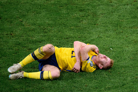 Dejan Kulusevski of Sweden in pain