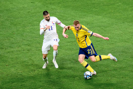 Yannick Carrasco of Belgium and Dejan Kulusevski of Sweden
