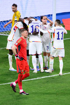 Goalkeeper Robin Olsen of Sweden looks dejected as Romelu