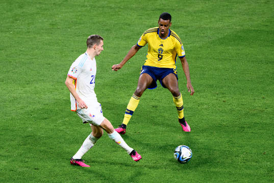 Timothy Castagne of Belgium and Alexander Isak of Sweden
