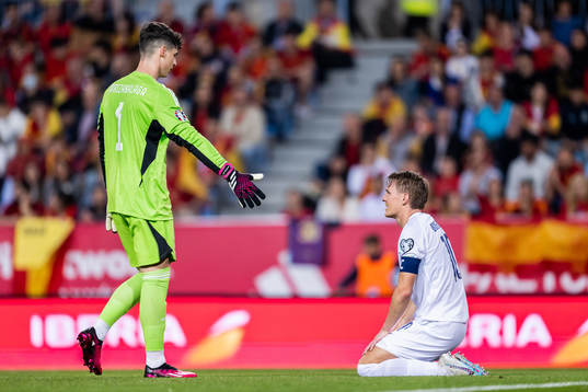 Goalkeeper Kepa Arrizabalaga of Spain and Martin Ødegaard