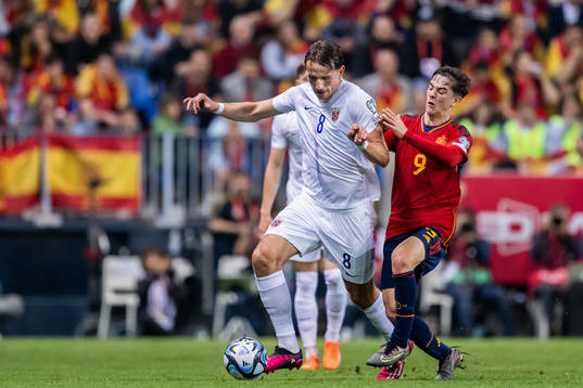 Sander Berge of Norway and Gavi of Spain