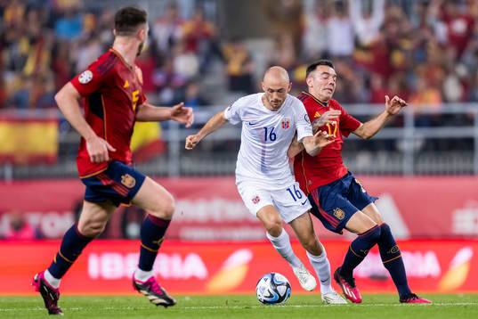 Fredrik Aursnes of Norway and Iago Aspas of Spain