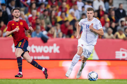 Aymeric Laporte of Spain and Alexander Sørloth of Norway