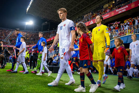 Martin Ødegaard and goalkeeper Ørjan Håskjold Nyland of