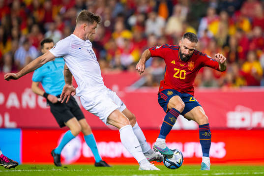 Alexander Sørloth of Norway and Dani Carvajal of Spain