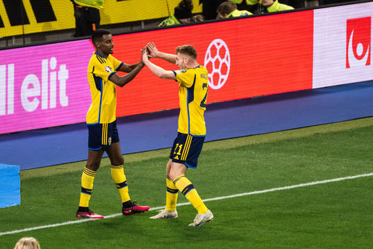 Alexander Isak and Dejan Kulusevski of Sweden celebrate