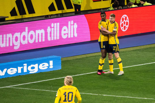 Alexander Isak and Dejan Kulusevski of Sweden celebrate