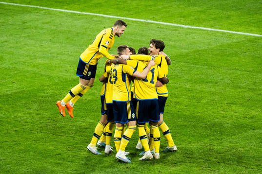 Viktor Gyökeres of Sweden celebrates with teammates