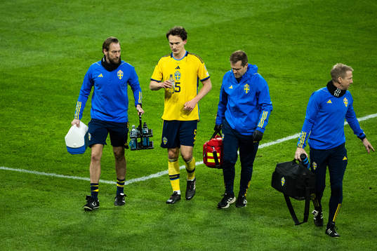 Hjalmar Ekdal of Sweden receives medical attention