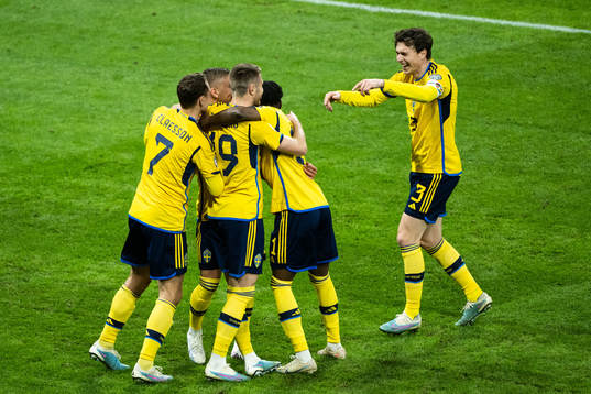 Viktor Gyökeres of Sweden celebrates with teammates