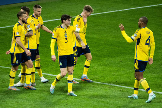 Victor Nilsson Lindelöf and Isak Hien celebrate