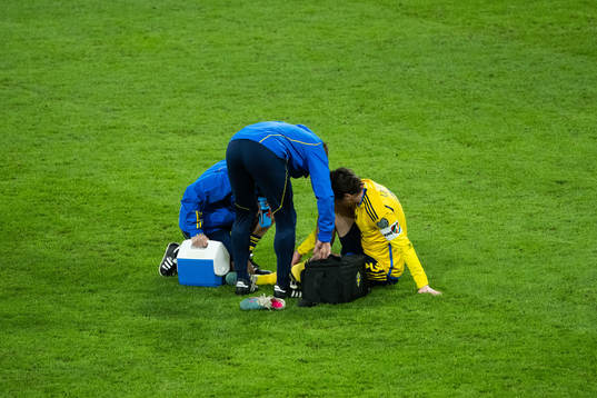 Victor Nilsson Lindelöf of Sweden receives medical