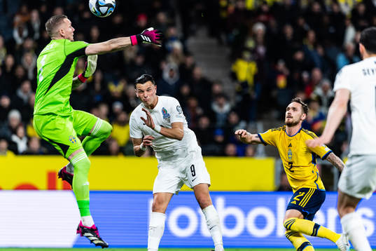 Goalkeeper Robin Olsen of Sweden, Renat Dadashov of