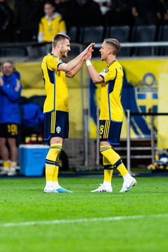 Mattias Svanberg and Jesper Karlsson of Sweden celebrates