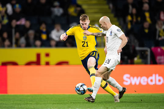 Dejan Kulusevski of Sweden and Richard Almeida of Azerbaijan