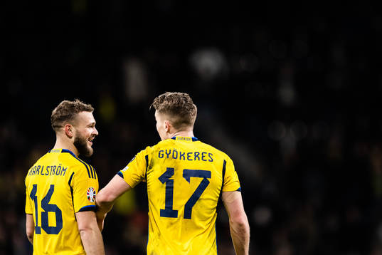 Jesper Karlström and Viktor Gyökeres of Sweden celebrate