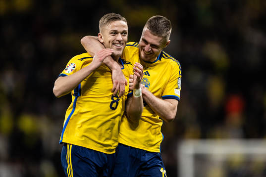 Jesper Karlsson of Sweden celebrate with Mattias Svanberg
