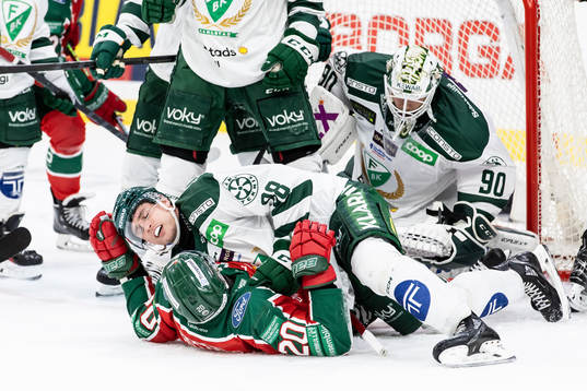 Färjestads Mattias Göransson och Frölundas Joel Lundqvist
