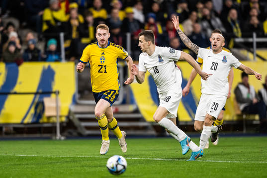Dejan Kulusevski of Sweden against Anton Krivotsyuk and