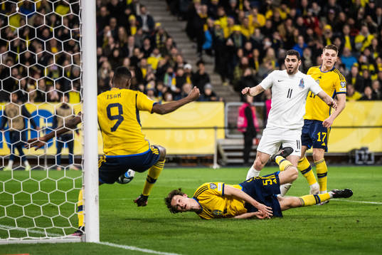 Alexander Isak and Hjalmar Ekdal of Sweden scores a goal