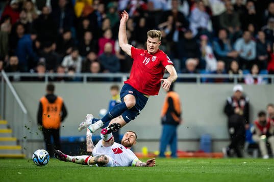 Guram Kashia of Georgia and Alexander Sørloth of Norway